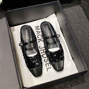 Black sequin closed-toe Mary Jane mules in a box
