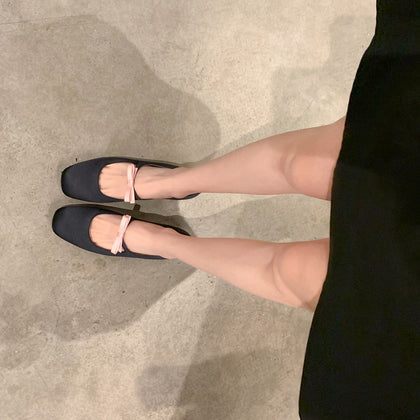 Black-pink bow Mary Jane ballet flats worn