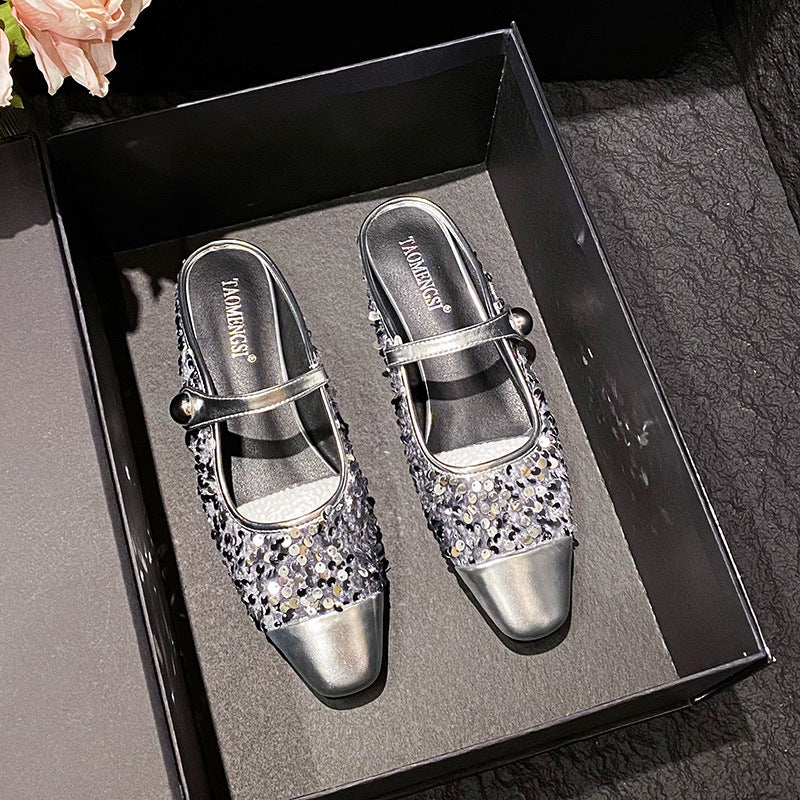 Silver sequin closed-toe Mary Jane mules in a box
