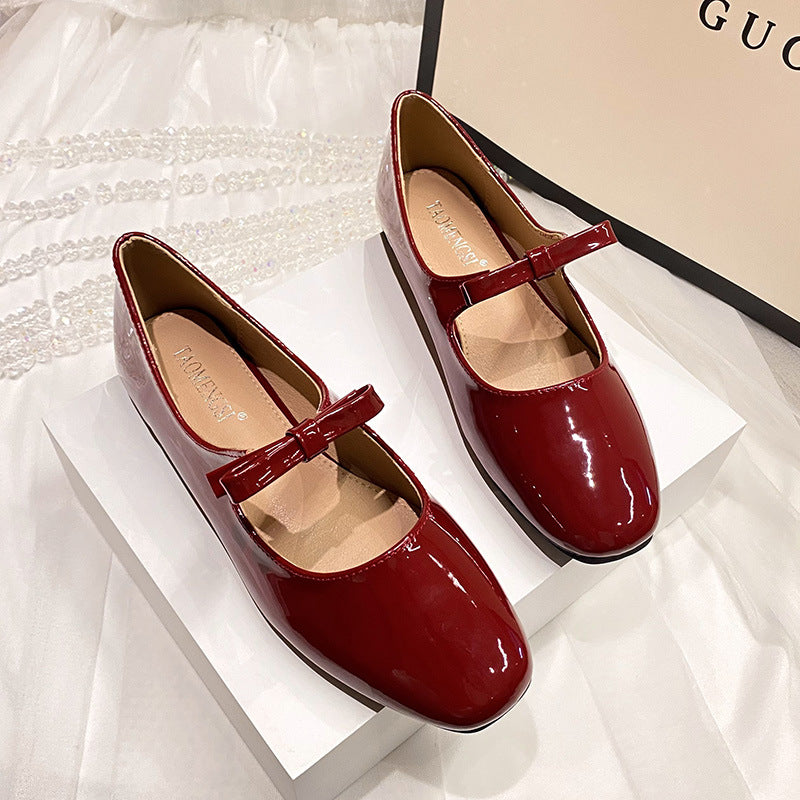 Red patent bow Mary Jane ballet flat pair