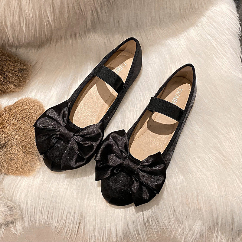 Black oversized bow Mary Jane ballet flat pair