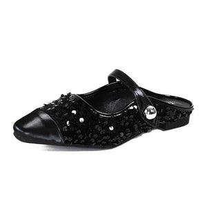 Black sequin Mary Jane mule side view on white