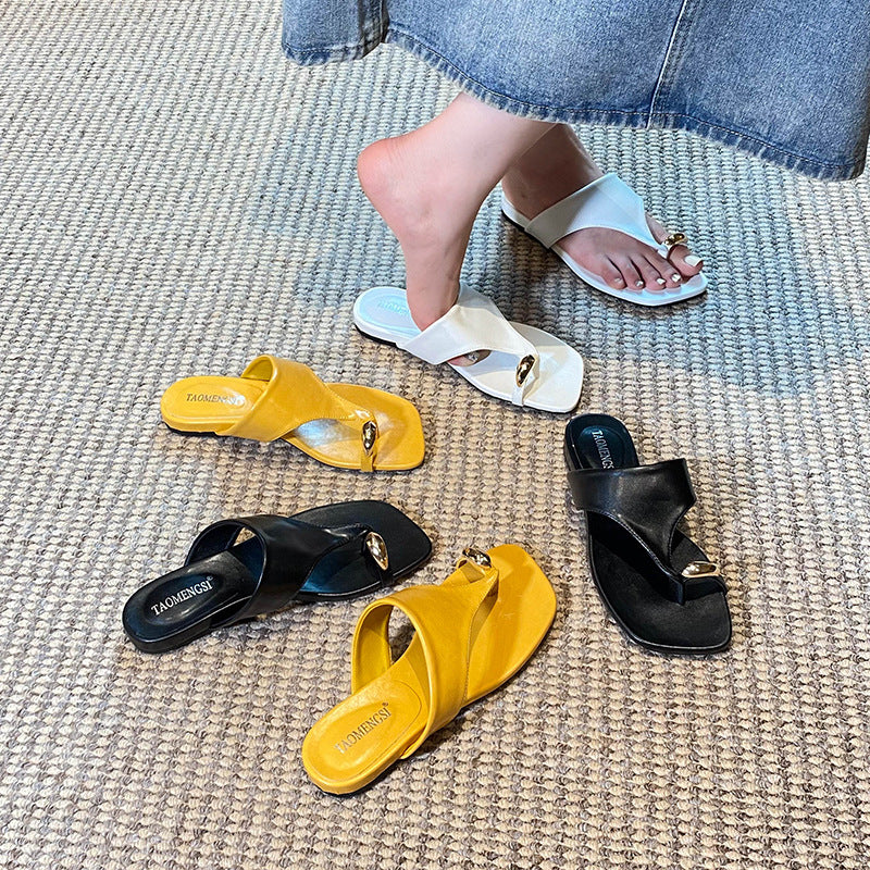 Yellow, black and white toe-post sandal color options