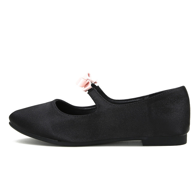 Black-pink bow Mary Jane ballet flat side view on white