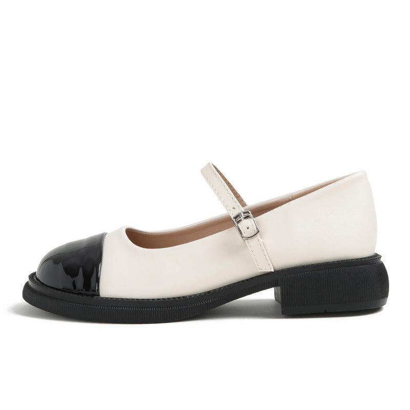 Apricot cap-toe Mary Jane pump side view on white