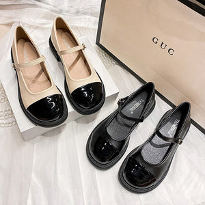 Apricot and black platform Mary Jane pump pairs